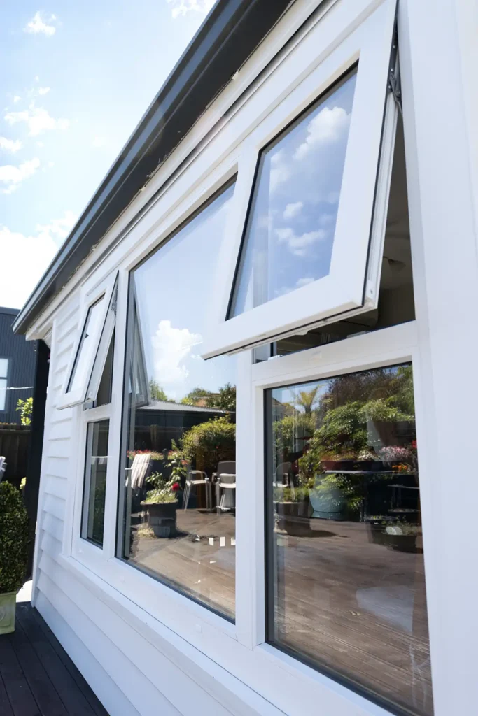 exterior uPVC double glazed awning windows open on white weatherboard villa Christchurch